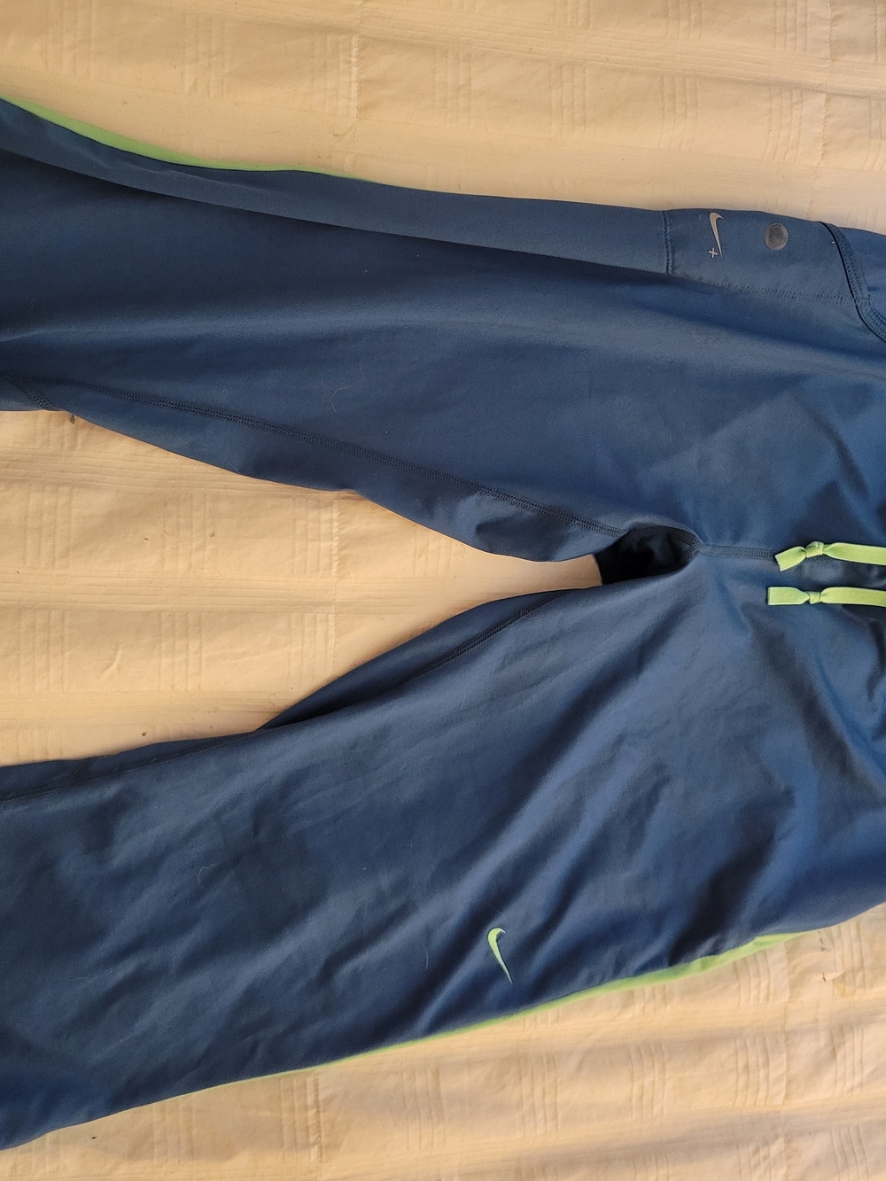 Nike Women’s Blue Track Pants with Lime Green Accents